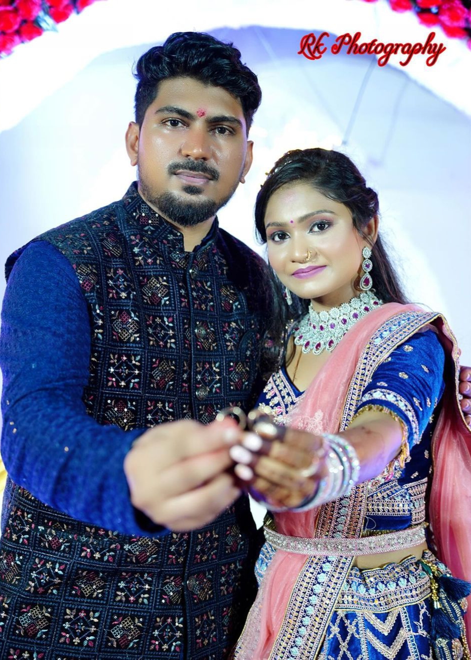 Couple posing together at their ring ceremony